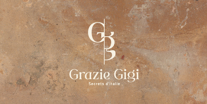 Grazie Gigi logo header sur matiere brute